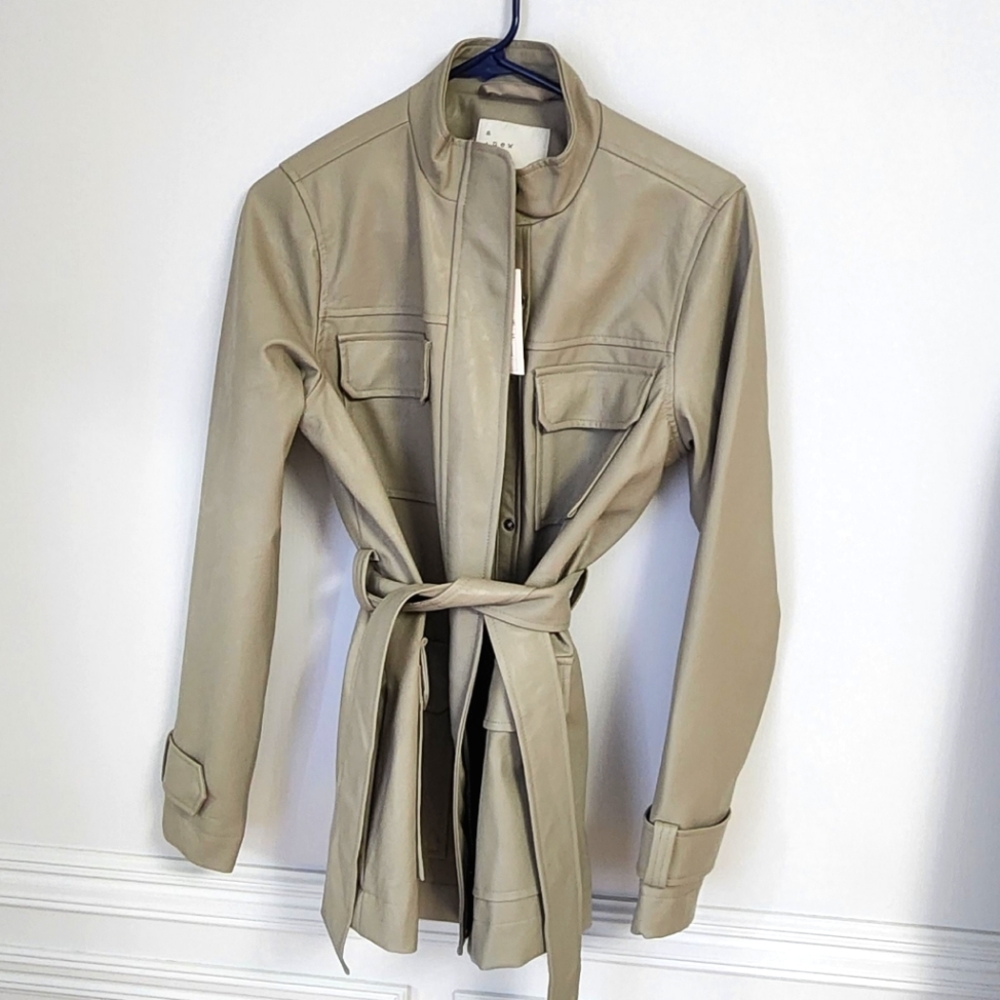 Faux leather jacket, Size xs, nwt, never worn, ties at the waist